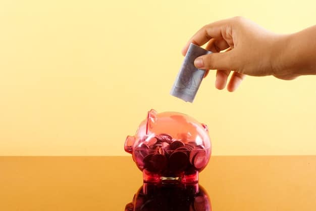 A close-up shot of a hand placing coins into a piggy bank, symbolizing savings and financial prudence.