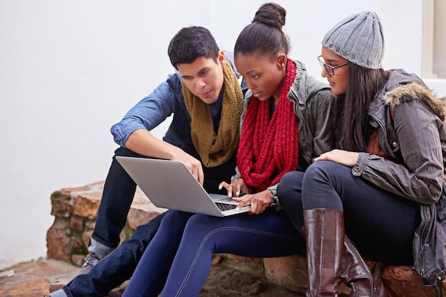 A diverse group of students studying with laptops and books, representing the various beneficiaries of the Student Loan Forgiveness Program.