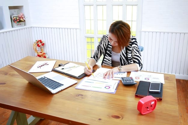 A person carefully organizing financial documents related to assets and income, with a calculator and pen nearby. The scene conveys the process of meticulous financial planning for college.