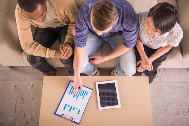 Three young adults are looking at a bar graph on a tablet to help them understand financial planning data for the new tax law.