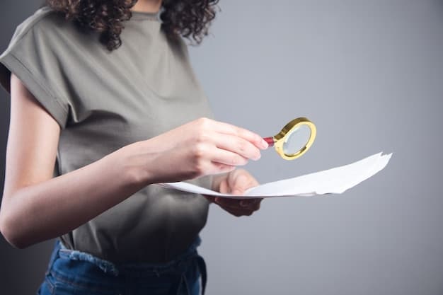 A close-up shot of a woman reviewing a divorce settlement document with a magnifying glass, highlighting key financial figures and clauses.