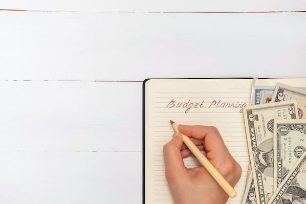 A hand holding cash and coins over a notebook with handwritten budget categories, illustrating the process of allocating funds to different expenses.