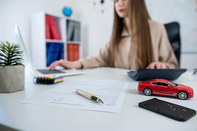 A person reviewing various insurance documents at a desk, including health, life, and auto insurance policies.