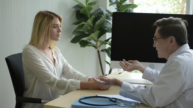 A doctor explaining health insurance options to a patient, seated at a desk in a well-lit office. The atmosphere is professional and reassuring.