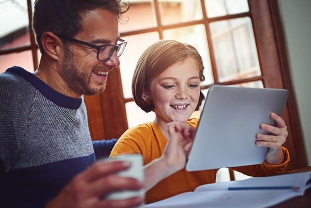 A parent and child using a tablet to review investment options for a 529 plan, with a focus on understanding the tax implications and benefits. The image aims to depict a family engaged in financial planning.