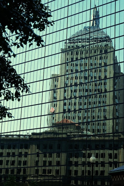 A photo of the Federal Reserve building in Washington D.C., with a subtly overlaid graph representing interest rate trends.