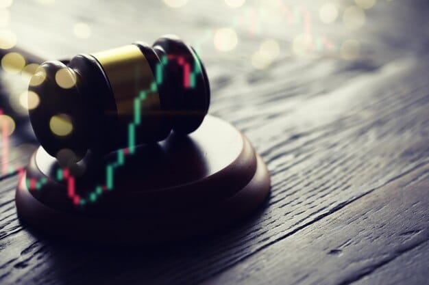 A close-up of a gavel striking a sound block, with a blurred background of financial charts, symbolizing the Federal Reserve's decision-making process.