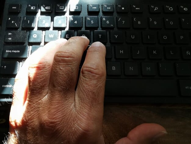 A close-up of a hand typing on a laptop, with a faint overlay of a lock symbol. Stress the idea of digital security and protection of personal data.