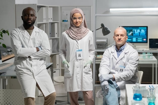 A diverse team of medical professionals (doctors, nurses) in labcoats working together in a modern, clean hospital environment.