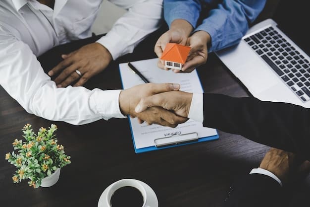 A handshake symbolizing an insurance agreement, highlighting the importance of proper coverage in financial planning.